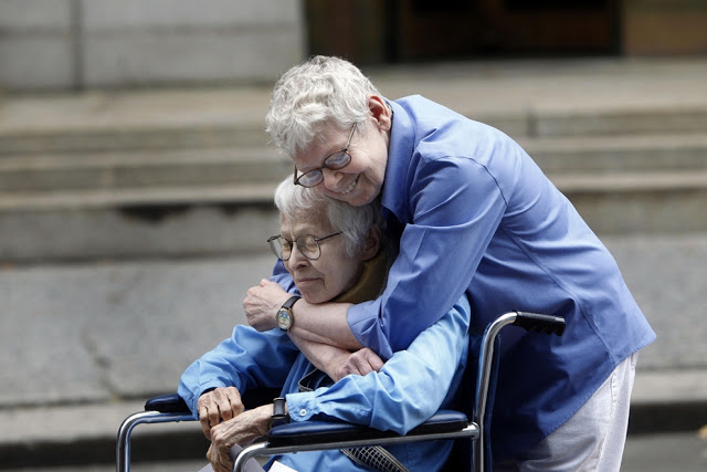 Phyllis Siegel, 76, left, and Connie Kopelov, 84, both of New York, embrace after becoming the first same-sex couple to get married at the Manhattan City Clerk's office in 2011.