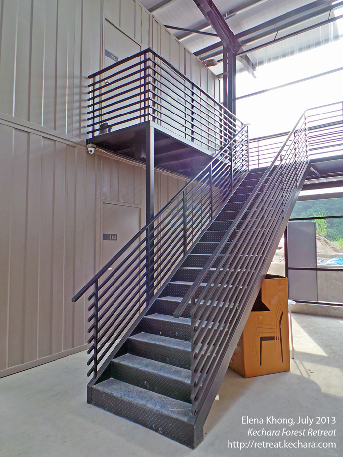 Pretty stairs in Dukkar Apartments...I love the industrial look!