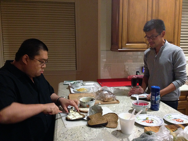 Rinpoche makes a sandwich for a student