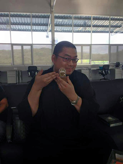 Rinpoche before presenting a gift to a student